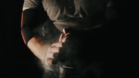  Strongman athlete hands clapping chalk powder sportsman preparing training work Stock Footage 150984343