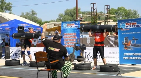Strongmans competetion in lifting heavy deck Stock Footage 52778993