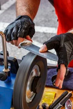 Stropping wheel for final polishing of sharpened knife Stock Photos