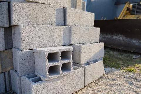 Structural blocks of strings on the mountain slopes on the excavator. Stock Photos