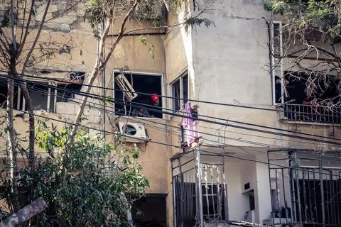 Structural damage and destruction of buildings following the Iranian ballis.. 스톡 사진