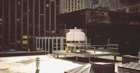 Structural elements on a city rooftop during daylight hours Stock Footage 327255425