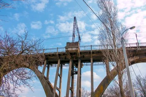 Structural elements of the old, built in the USSR, railway bridge across th.. Stock Photos