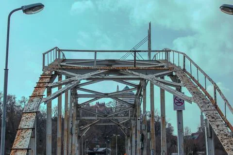 Structural elements of the old pedestrian bridge built in the USSR across t.. Stock Photos