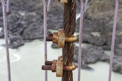 Structural elements of a suspended metal bridge over the Katun River Fotos Stock