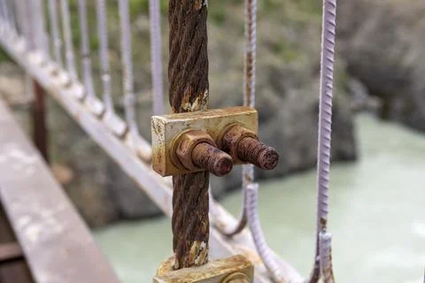 Structural elements of a suspended metal bridge over the Katun River Fotos Stock