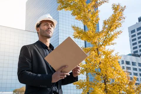 Structural engineer architect checking and authorize plans to work for the Stock Photos