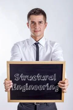 Structural Engineering - Young businessman holding chalkboard with text Stock Photos