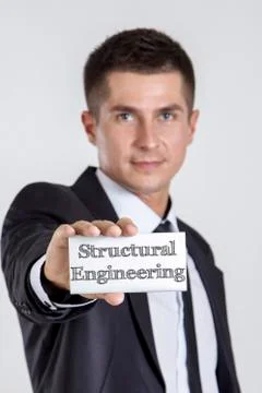 Structural Engineering - Young businessman holding a white card with text Stock Photos