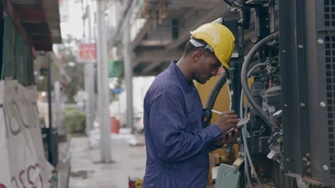 Structural engineers and construction workers are holding blueprints inspecting  Stock Footage 241427561