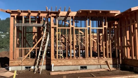 Structural Frame Of A Wooden House Under Construction. static Stock Footage 165332532