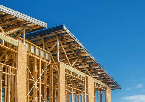 Structural framework and roof of a new housing project Stock Photos