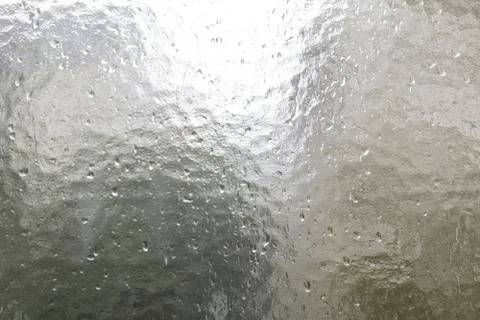 Structural glass pane with rain drops Stock Photos