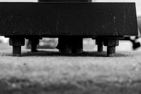 Structural support on concrete with gap to main plate and anchor bolts Stock Photos