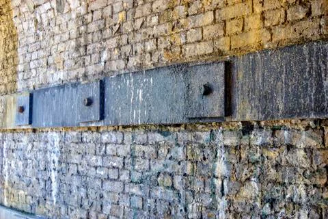 Structural Ties on Inner Side of Railway Arch with Securing Plates Stock Photos