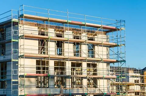 Structural work View of Structural work with scaffolding of a residential ... Stock Photos