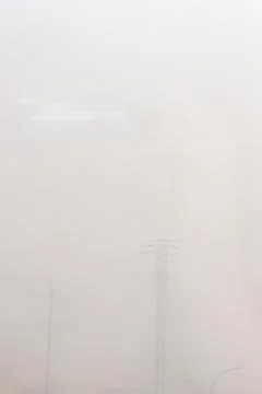 Structure Above the Pylon in the Mist Stock Photos