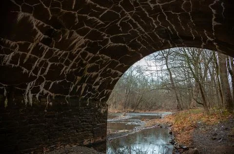 Structure of ancient stonework of eight-arch bridge in  Dark Hollow Park, P.. 写真素材