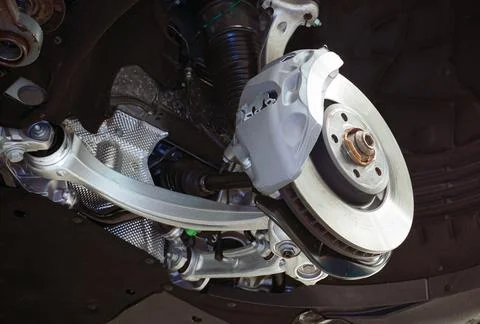 The structure and elements of the  suspension of a modern luxury car. Stock Photos