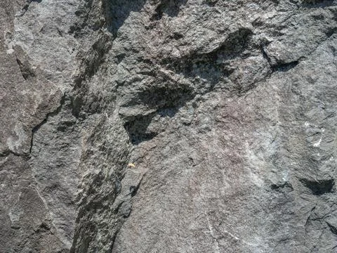 Structure of black stone. Background . Solid natural material. 写真素材