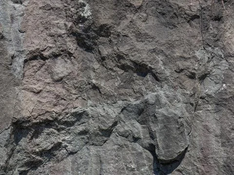 Structure of black stone. Background . Solid natural material. 写真素材