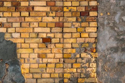 Structure With Broken Stucco And Plaster Stock Photos