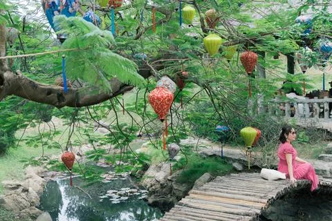 The structure of a building is visible, with lush trees behind it Ninh Binh.. Stock Photos