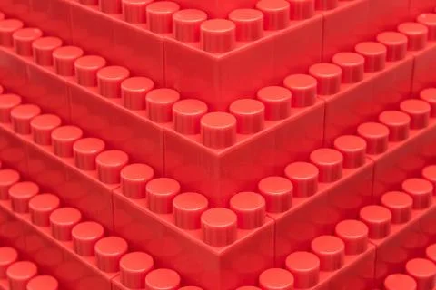 Structure of children's bricks of the designer of red color Stock Photos