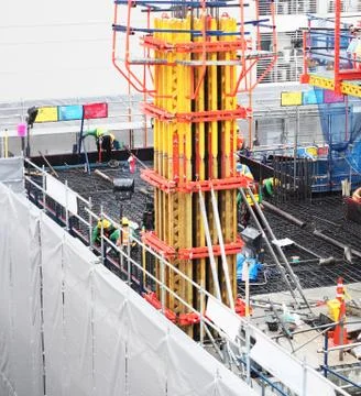 Structure of concreat pole and wire structure floor in high construction area Stock Photos