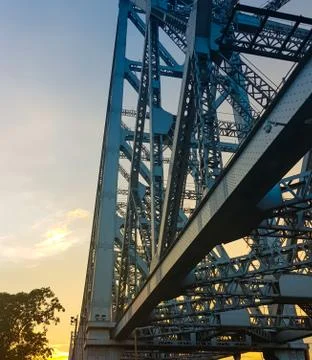 Structure of the famous Howrah Bridge in the evening in Kolkata, India Stock Photos