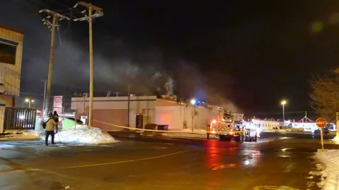 Structure fire at night with heavy smoke Stock Footage 139663797