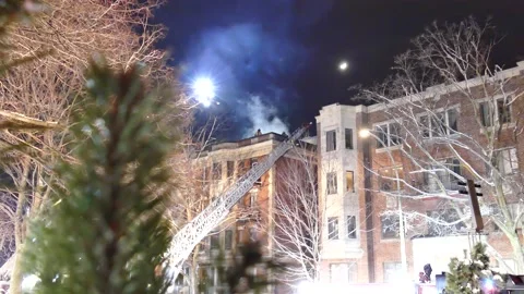 Structure fire with smoke at night Stock Footage 139663869