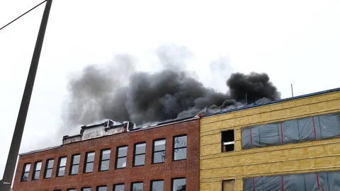 Structure fire with white, grey and black smoke Stock Footage 114945482