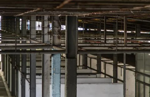 The structure inside the warehouse with light pole. Stock Photos