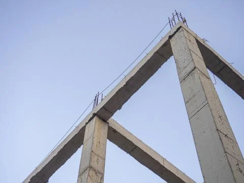 Structure made of concrete piles. Frame of a house under construction. Ston.. 스톡 사진