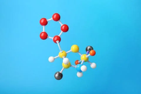 Structure of molecule on light blue background. Chemical model Stock Photos