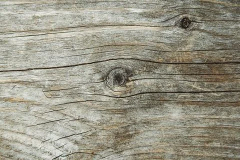 The structure of the old board. Surface with cracks and knots. Lines and patt Stock Photos