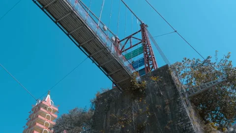 The structure of the pedestrian cable-stayed bridge over sacred Ganges River Stock Footage 108111508