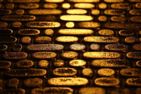 Structure of road pavement in the night the reflection of the lights Stock Photos
