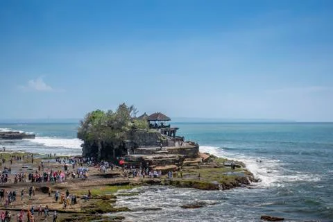 Structure of rock construction standing on the seashore in beautiful sunny da Stock Photos