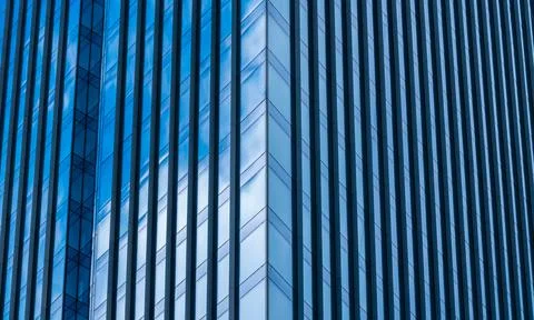 Structure skyscraper glass surface, office building, sky and clouds reflection Stock Photos