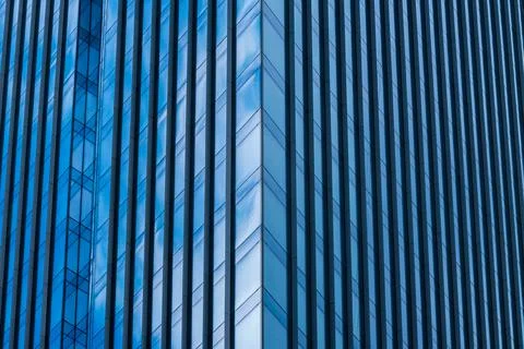 Structure skyscraper glass surface, office building, sky and clouds reflection Stock Photos