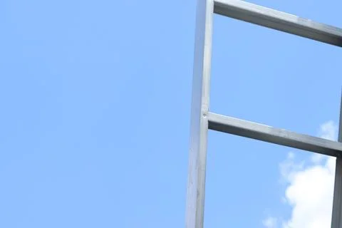 Structure of a steel frame for construction against the sky Stock Photos