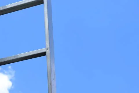 Structure of a steel frame for construction against the sky Foto stock