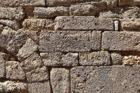 Structure, stone wall background of the ancient city of Phaselis Stock Photos