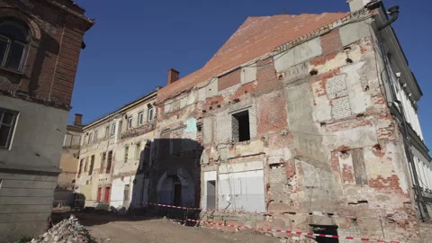 Structure surrounded by warning tape shows fragile state 動画素材 316084048