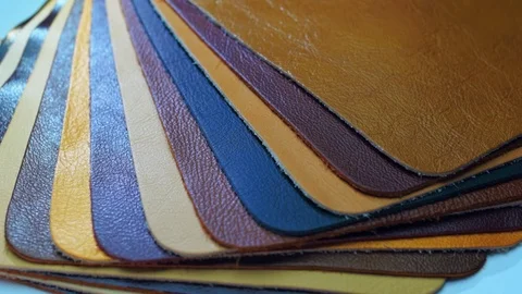 Structure, texture and surface pattern of samples of leather in different colors Stock Footage 82723420