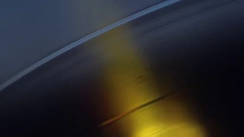 Structure, texture, surface pattern of vinyl disc. Color illumination, leaks Stock Footage 82742080