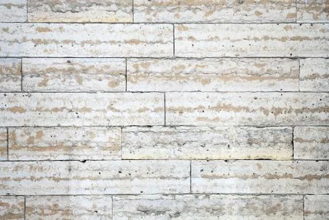 The structure of the wall of stone blocks under marble 库存照片