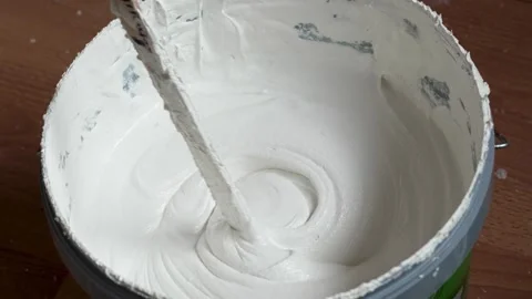 Structured Paint in Plastic Bucket, Close-Up Texture of Decorative Wall Coating 库存影片 331720660
